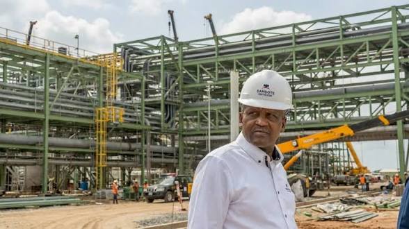 Aliko Dangote speaking during a business event as reports emerge about his $45 billion refinery and LNG expansion plan targeting $100 billion annual revenue growth.