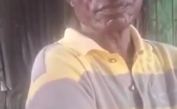 A man is apprehended by authorities following allegations of prolonged sexual abuse involving his 13-year-old daughter as bystanders gather nearby.