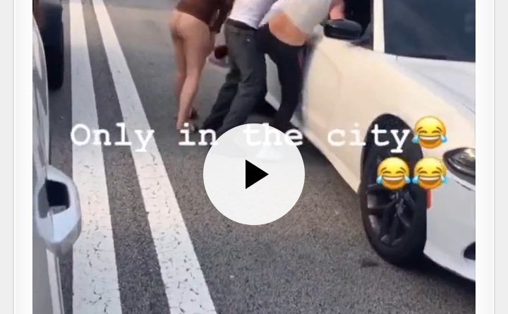 Viral video showing two women allegedly fighting in the middle of a busy road in Atlanta, Georgia, as traffic slows and bystanders gather to watch the altercation.